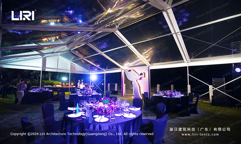 Durable party tent withstanding rain and wind, showcasing weather resistant PVC material